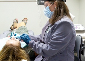 Patient receiving dental treatment