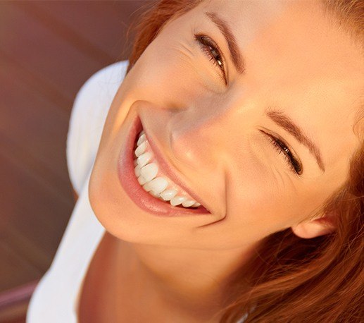 Woman sharing smile after gum recontouring