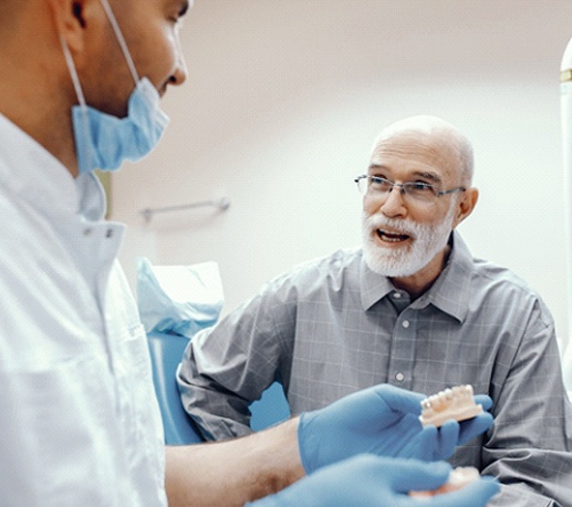 man at denture consultation