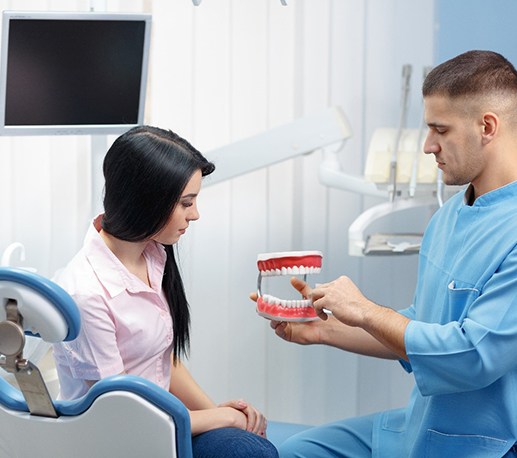 Patient listening to emergency dentist in Granger