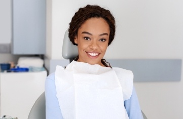Young woman smiling after orthodontic treatment