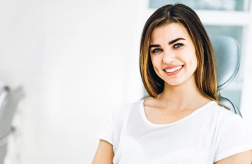 Woman smiling after cosmetic dentistry