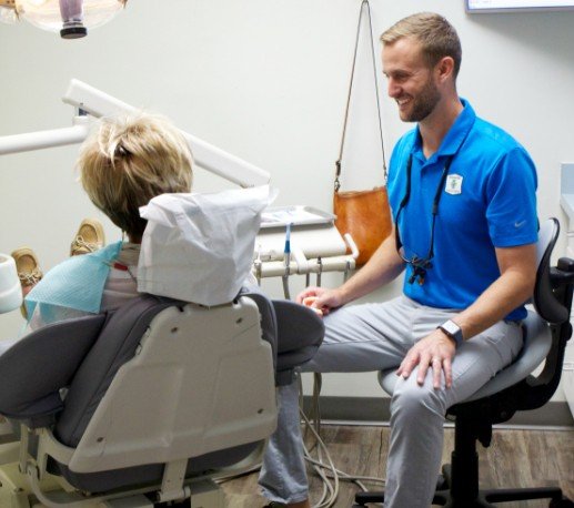 Doctor Hickey smiling at dental patient
