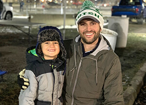 Doctor Hickey smiling with his son