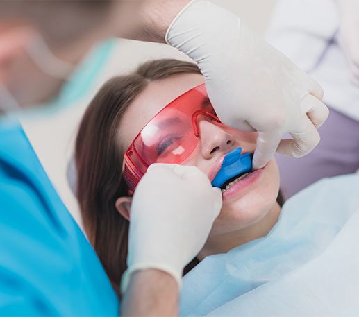 Child receiving fluoride treatment