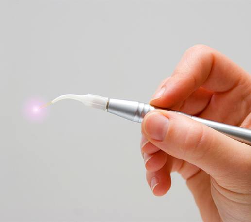 Hand held soft tissue laser dentistry tool