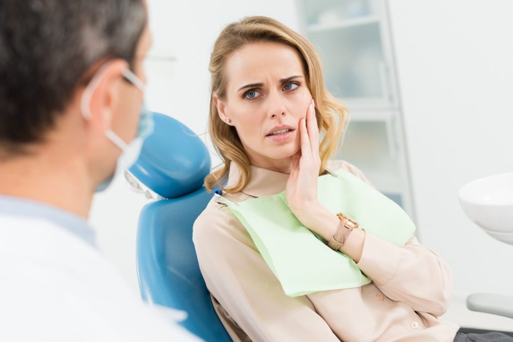 Woman who is concerned about her toothache.