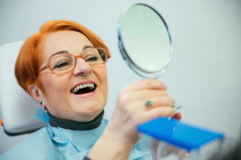 Smiling person with dentures